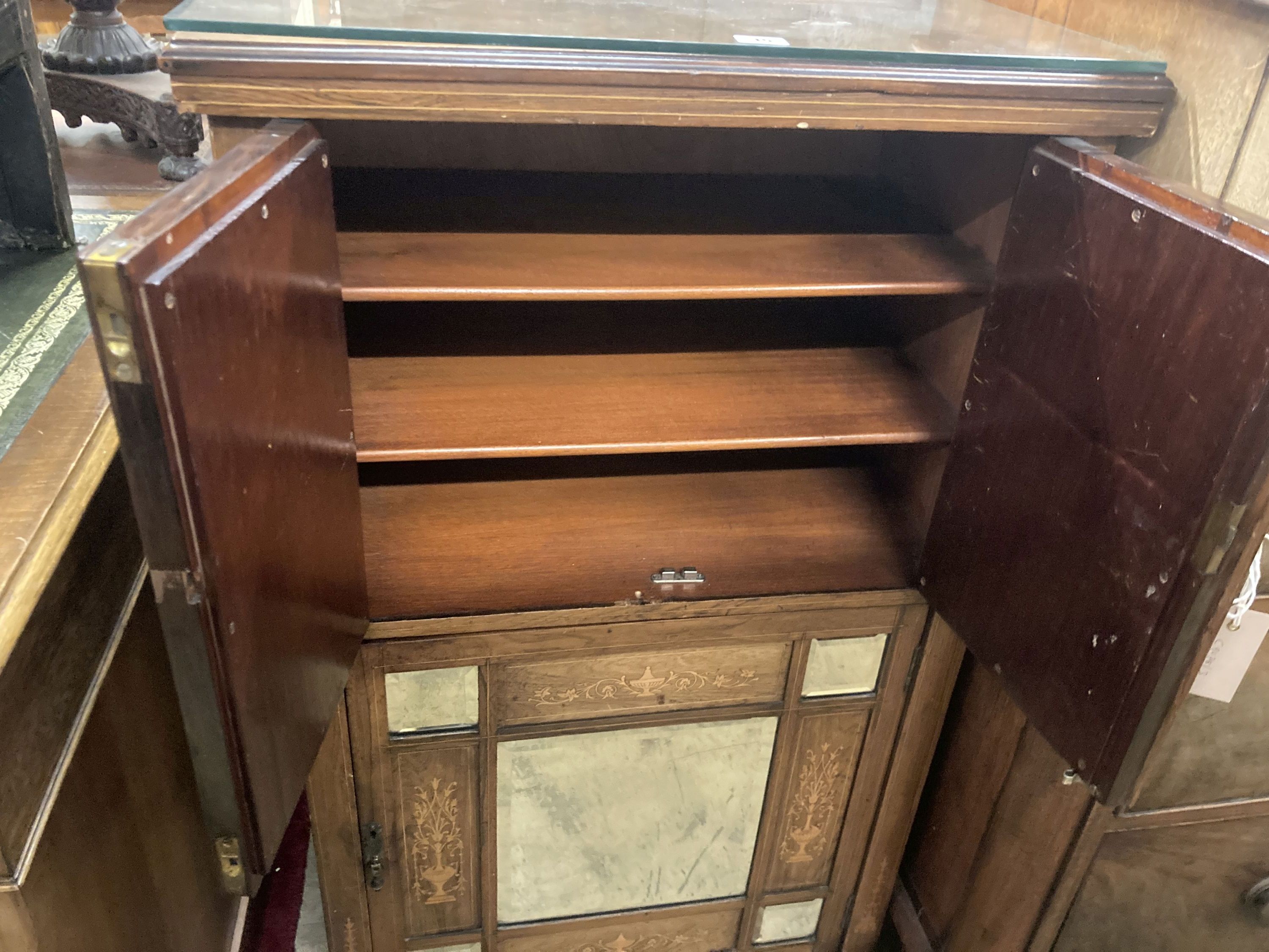 A late Victorian inlaid rosewood mirrored music cabinet, width 61cm, depth 38cm, height 105cm